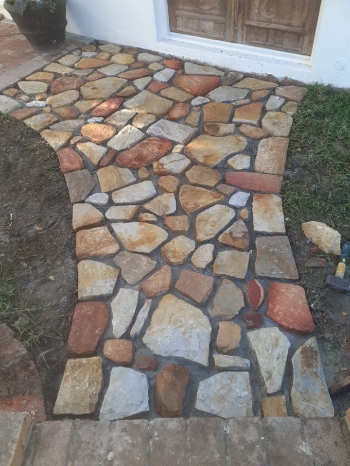 Crazy paving stone pathway leading to a front door in Cape Town